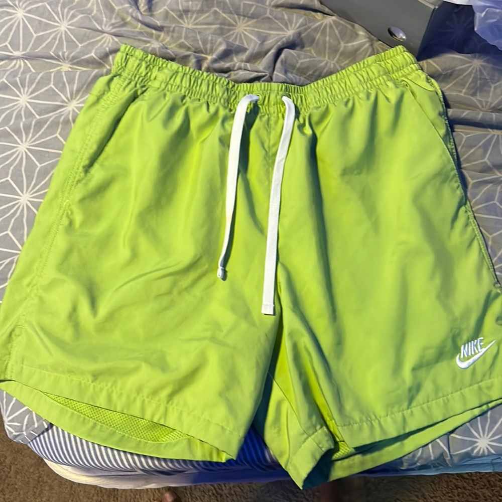 Green Nike shorts